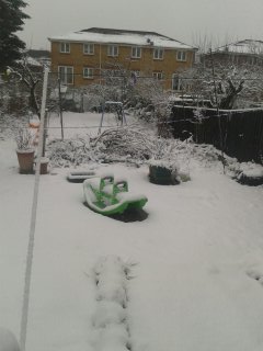 My bro's See-Saw, and random broken trees and plant pots with nothing in particular inside them